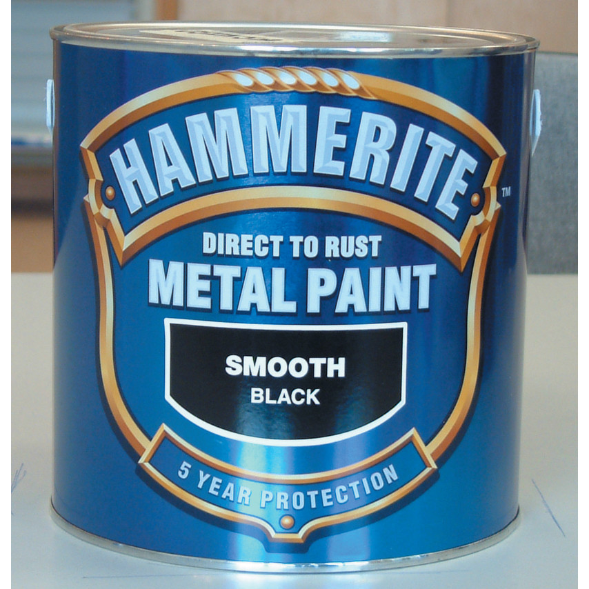 Hammerite Direct to Rust Smooth Finish Metal Paint in black, presented in a blue cylindrical tin with a prominent logo and text indicating 5-year protection.