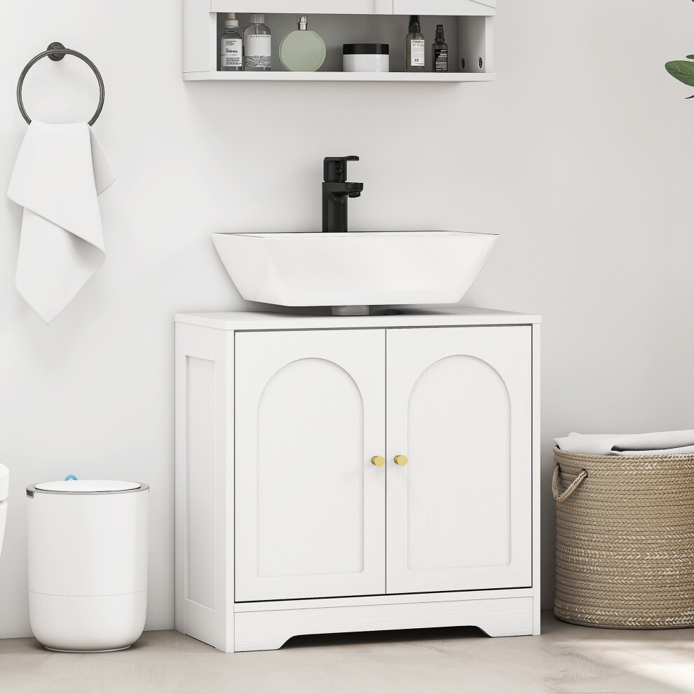 Modern white under sink cabinet with arched doors, featuring a black faucet and a white basin on top, complemented by a woven storage basket and a sleek design.
