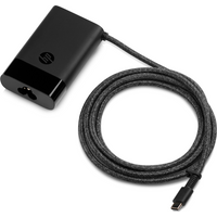 Black HP 65W USB-C power adapter with a long braided cable and HP logo on the adapter body.