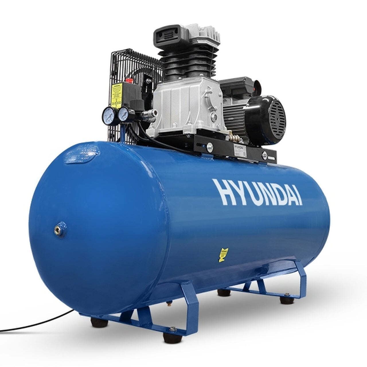 Blue Hyundai 200-litre electric belt drive air compressor with oil lubrication, featuring a powerful motor, pressure gauge, and sturdy metal construction.