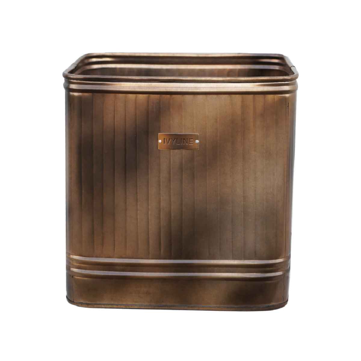 Antique brass outdoor planter with a square shape, featuring ribbed detailing and a polished finish, ideal for garden use.