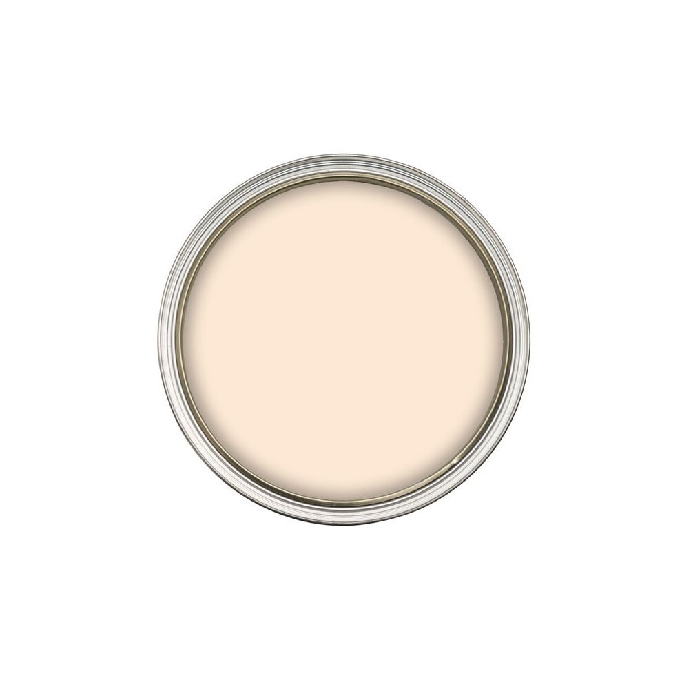 Round tin of Johnstone's Matt Tester paint in Magnolia color, featuring a smooth, creamy off-white surface with a metallic silver rim.