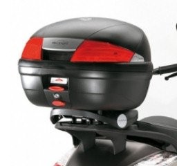 Kappa K35N MONOLOCK top case in black, featuring a sleek design, 35-litre capacity, and red reflective accents for visibility, mounted securely on a motorcycle.