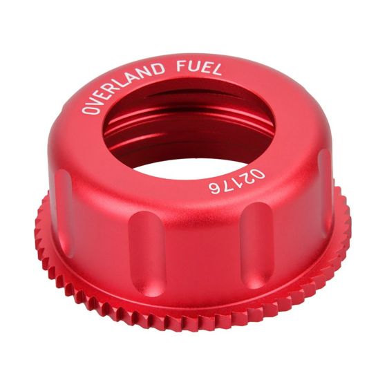 Red CNC alloy screw cap with a textured edge and "OVERLAND FUEL" engraved on the top, designed for durability and a secure fit.
