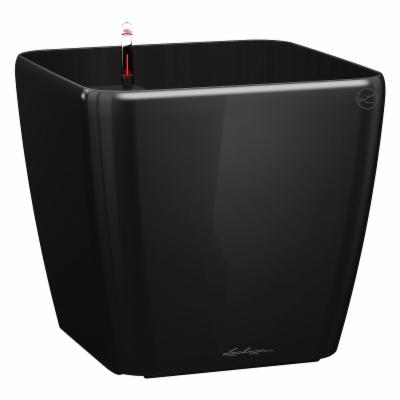 Black square planter made of glossy plastic, featuring a built-in water reservoir and a red water level indicator, designed for indoor or outdoor use.