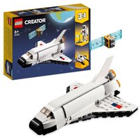 LEGO Creator 3 in 1 set with white space shuttle, spaceship, and satellite, featuring black accents and cockpit details.