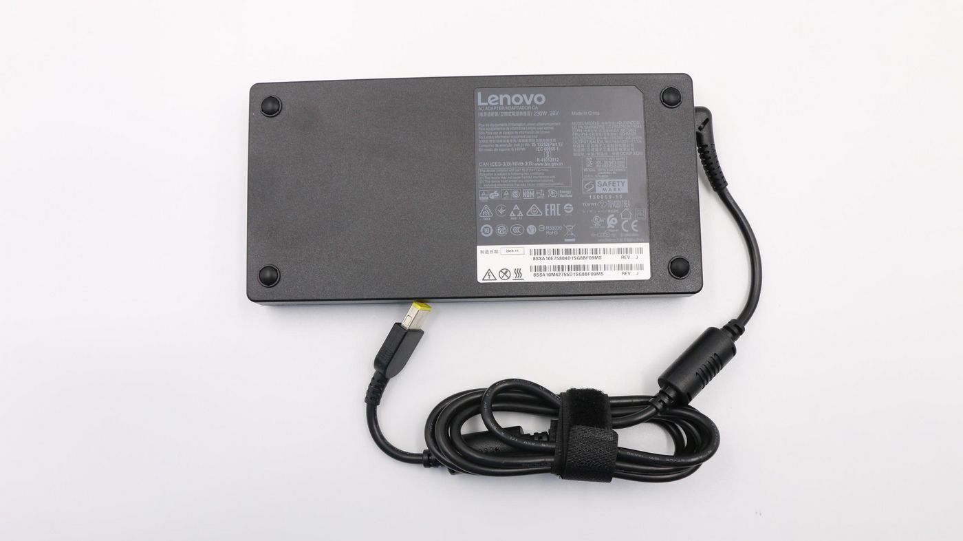 Black Lenovo 00HM626 power adapter with a textured surface, featuring a 230 W output, a detachable cable, and various certification labels on the back.