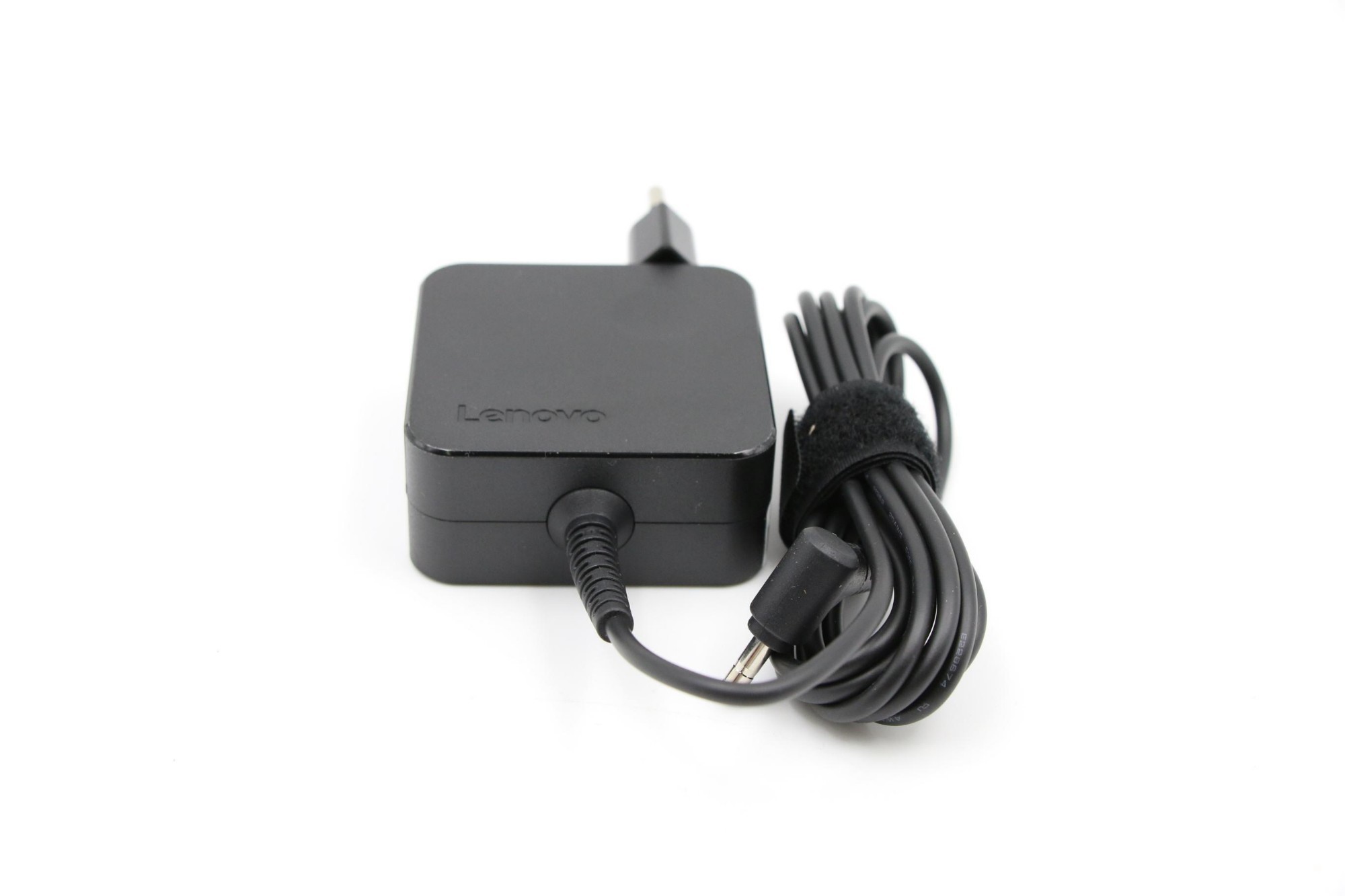 Black Lenovo 01FR135 power adapter with a compact square design, featuring a cable with a connector for charging devices, and a velcro strap for cable management.