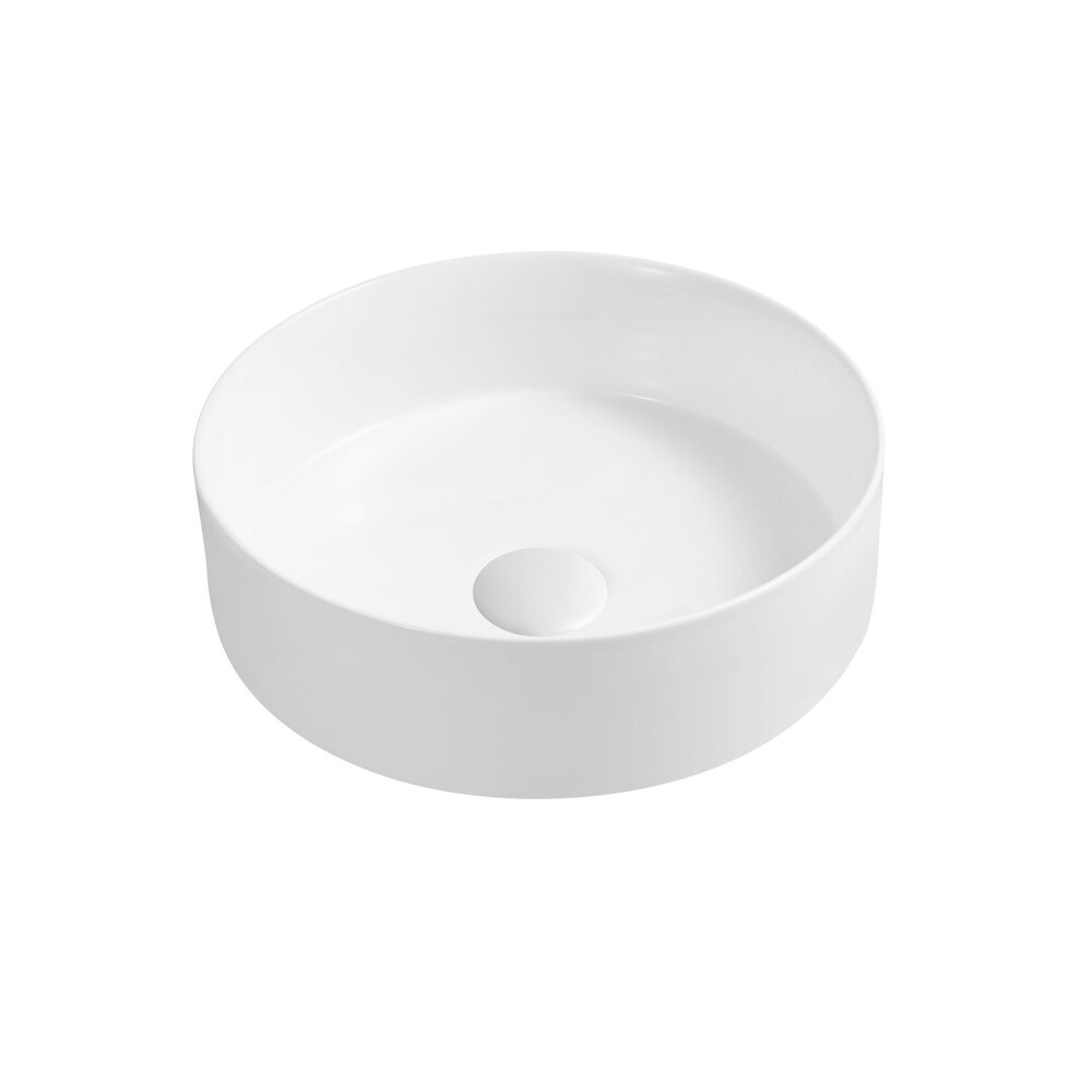 Matte white ceramic round countertop basin with a smooth, sleek surface and a central drain hole, designed for modern bathroom aesthetics.