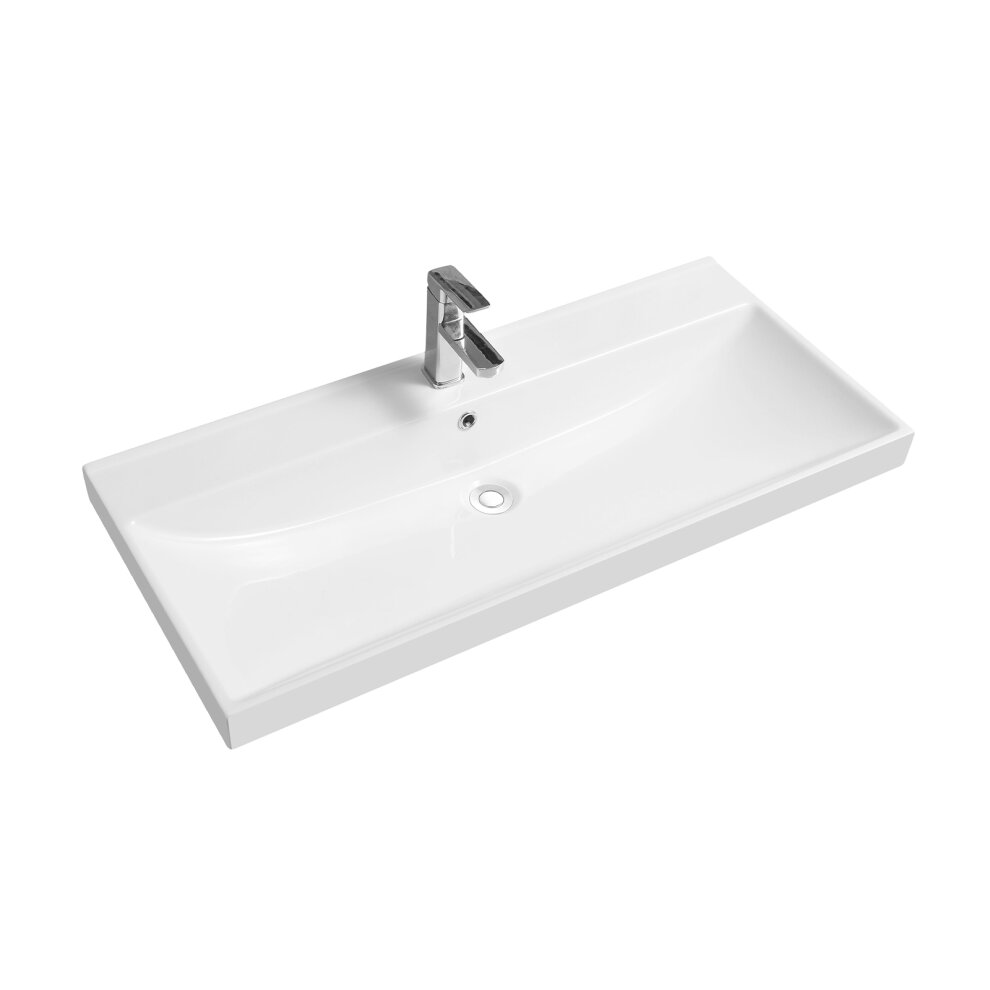 White ceramic inset basin with a full scoop design and thick edge, featuring a central drain hole and sleek chrome faucet, suitable for various sizes and styles.