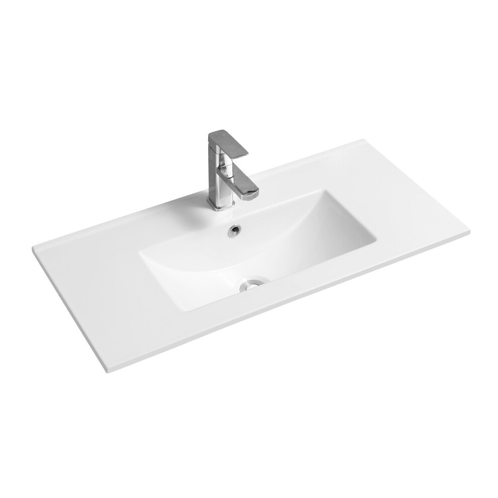 White ceramic 81cm thin-edge inset basin featuring a deep scoop design, complemented by a sleek chrome faucet and a minimalist rectangular shape.