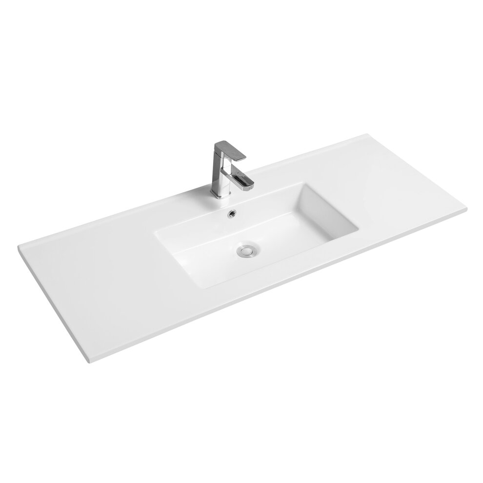 Rectangular white ceramic inset basin with a thin edge, featuring a central rectangular sink and a sleek chrome faucet on a smooth countertop.