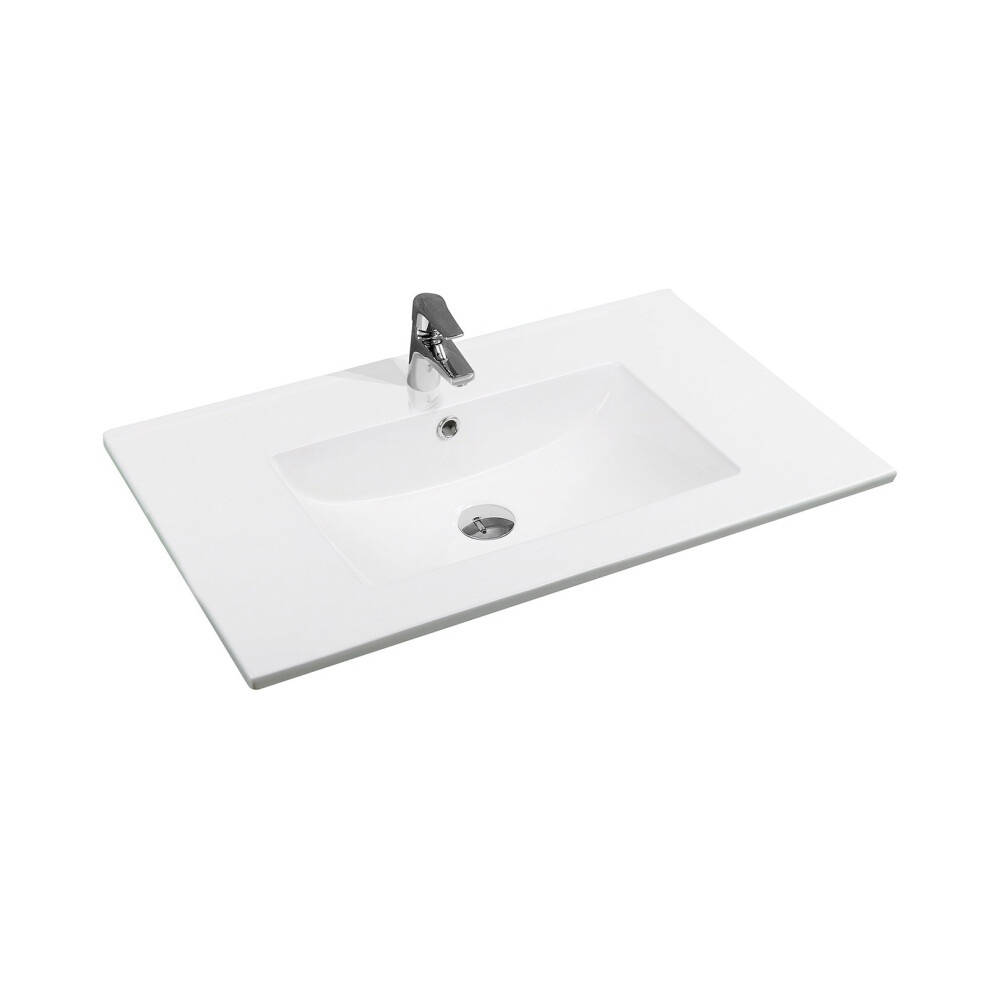 White ceramic 75cm x 45cm thin-edge inset basin featuring a scooped bowl design and a central drain, complemented by a sleek chrome faucet.