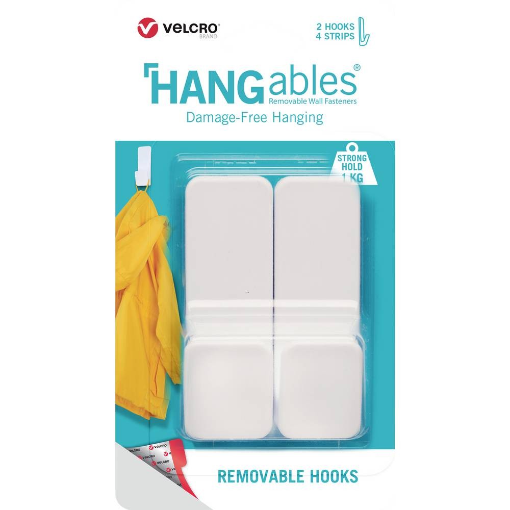 White removable wall fasteners featuring two hooks and four adhesive strips, designed for damage-free hanging, packaged in a clear plastic blister pack.