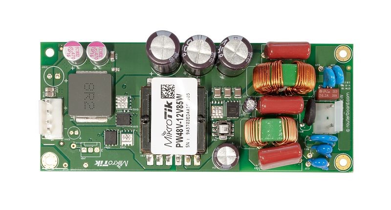 Green Mikrotik PW48V-12V85W power adapter/inverter featuring multiple capacitors, inductors, and a central transformer on a printed circuit board.