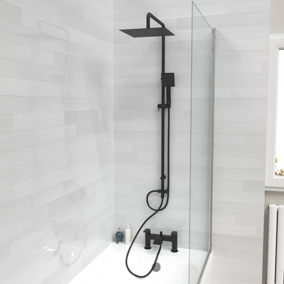 Matte black shower riser rail kit featuring a square overhead shower head, handheld handset, and mixer tap, set against a light tiled wall in a modern bathroom.