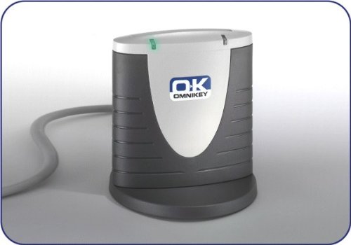 Gray and white USB2-connected smart card reader with a rounded design, featuring a green LED indicator and the Omnikey logo on the front.