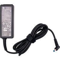 Black HP 45W AC adapter with 4.5mm connector, EU plug, and coiled cable secured with a velcro strap.
