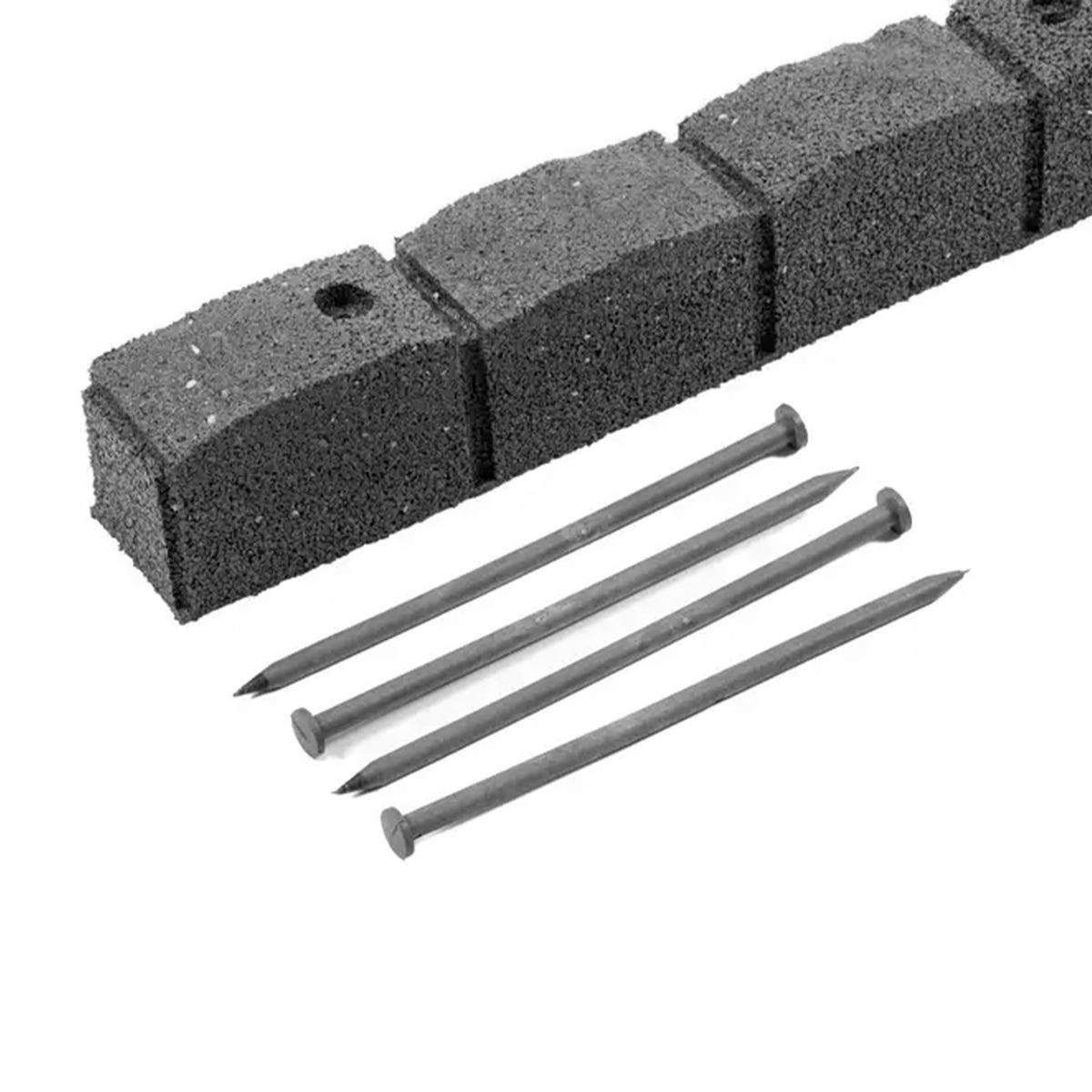 Four grey Roman stone garden borders made from eco-friendly material, featuring a textured surface and accompanied by four metal stakes for secure installation.