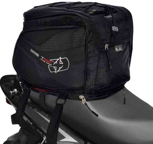 Black Oxford T25R Tailpack featuring a textured fabric, multiple zippered compartments, and a logo, designed for secure attachment on motorcycle seats.