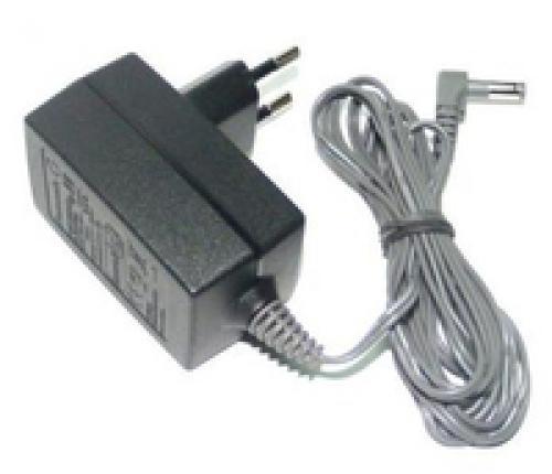 Black Panasonic KX-A423CE power adapter with a rectangular body, two prongs, and a grey cable featuring a right-angle connector.