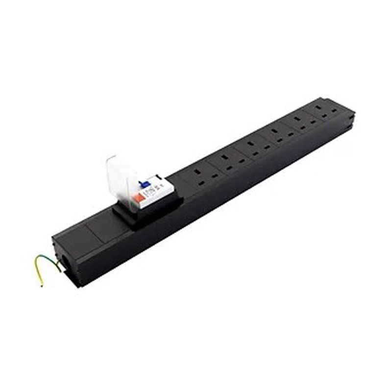 Black power strip with six industrial sockets, featuring a 3-pole connector for input/output, designed for under-desk installation, with a sturdy plastic body and a green grounding wire.