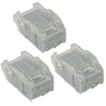 Three transparent plastic cartridges containing Ricoh Type V 5000 staples, designed for use in compatible staplers, showcasing a compact and functional design.