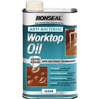 Ronseal Worktop Oil Clear 500ml can with blue label, anti-bacterial technology, and white cap.