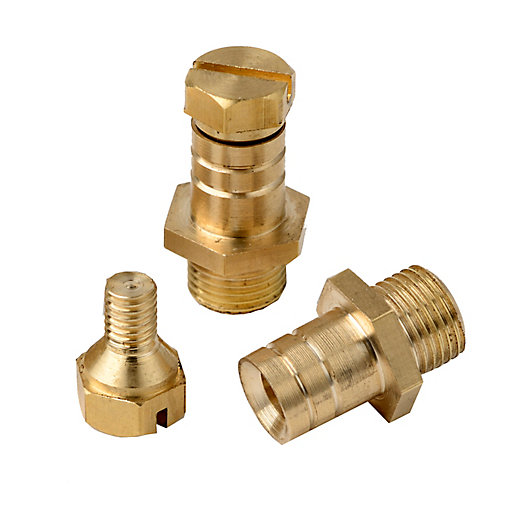 Three brass pressure test nipples in varying sizes, featuring hexagonal bases and threaded ends, designed for pressure testing applications.