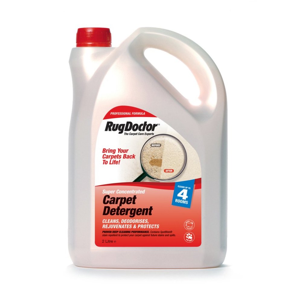 Clear plastic jug of Rug Doctor Carpet Detergent, 2 litres, featuring a red label with white text, and a handle for easy pouring, designed for cleaning and rejuvenating carpets.