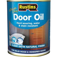 Rustins Quick Dry Door Oil can with blue label, showing door image and text "Clear Satin Natural Finish".