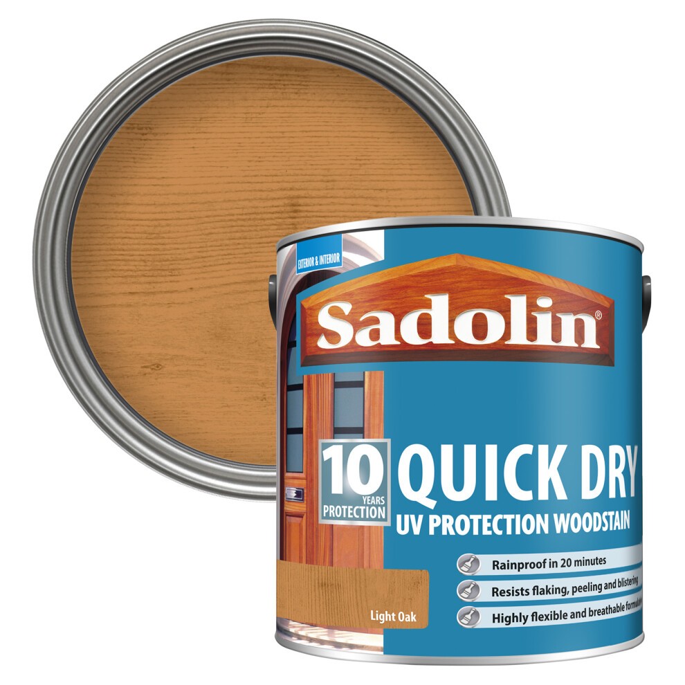 Light Oak Sadolin 10 Year Quick Dry Woodstain in a 2.5L metal tin, featuring a blue label with white text, showcasing a wood grain pattern on the lid, indicating UV protection and quick drying.