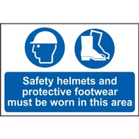 Blue and white safety sign with helmet and boot icons, text: "Safety helmets and protective footwear must be worn."