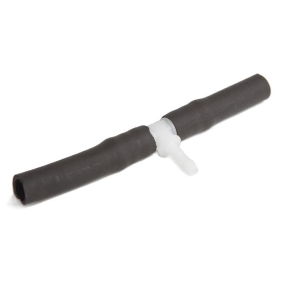 Black rubber T-connector with a white Viton valve, designed for fluid transfer, featuring two smooth ends and a central branch for easy installation in Scottoiler systems.
