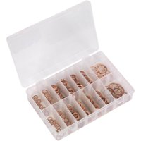 Clear plastic box with assorted copper diesel injector washers in various sizes, organized in compartments.