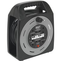 Black and gray Sealey 3 Socket Cable Extension Reel Box with handle and circular design, featuring three sockets and a power switch.