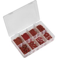 Clear plastic box with compartments holding red fibre washers, labeled "Sealey 600 Piece Fibre Washer Assortment Metric"