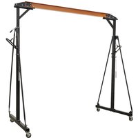 Black Sealey adjustable portable gantry crane with orange beam, four wheels, and triangular support frames.