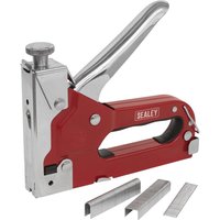 Red and silver Sealey staple and nail gun with ergonomic handle and visible staples and nails.