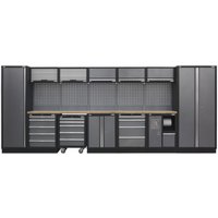 Sealey Superline Pro storage system with wood worktop, grey cabinets, drawers, and pegboard backing, 4.9 meters wide.
