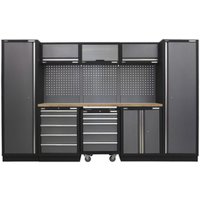 Black and grey Sealey storage system with wood worktop, tall cabinets, drawers, and pegboard backing.