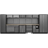 Sealey Superline Pro storage system, dark gray cabinets, pressed wood worktop, pegboard back, multiple drawers.