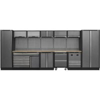 Black and grey storage system with pressed wood worktop, multiple cabinets, drawers, and pegboard backing.