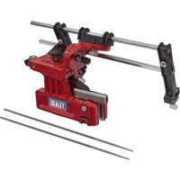 Red Sealey bar mount chainsaw chain sharpening guide with adjustable clamps and two metal guide rods.