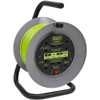 Green Sealey cable reel with thermal trip, four 230V sockets, 15m length, black handle, and grey frame.