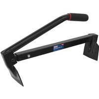 Black Sealey brick carrier lifting tongs with padded handle and adjustable metal arms for gripping bricks.