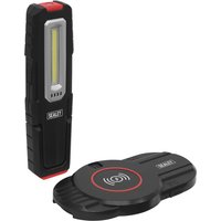 Black Sealey COB LED inspection light with red accents and wireless charging base, featuring a slim rectangular design.