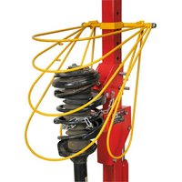 Red and yellow Sealey coil spring compressor restraint system with curved metal bars and mounted spring.