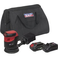 Red and black Sealey cordless orbital palm sander with battery, charger, dust bag, and branded carrying case.