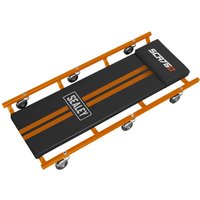 Orange Sealey Deluxe creeper with black cushioned surface, orange frame, and six swivel casters.
